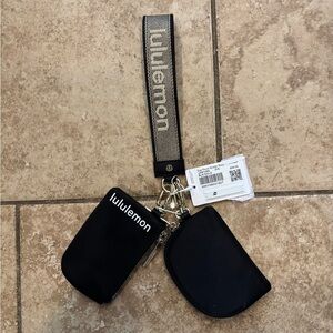Lululemon Dual pouch wristlet Black/ Gold NWT